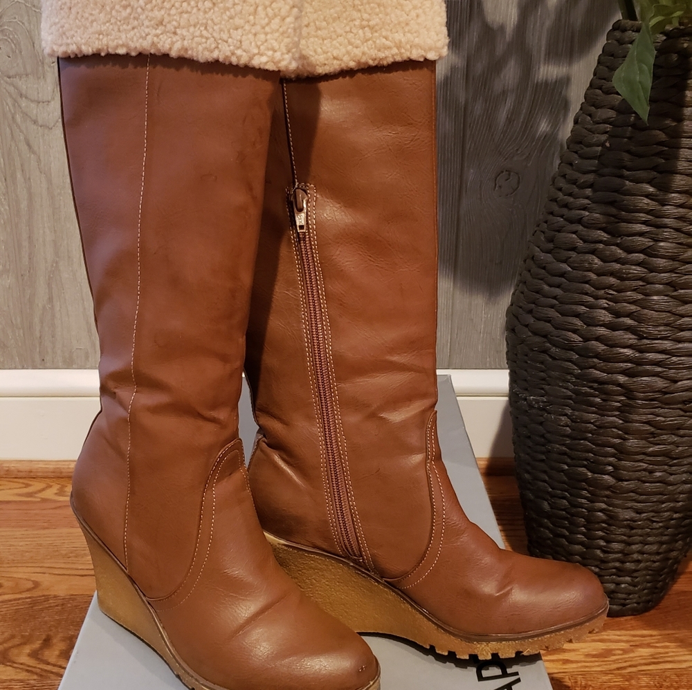 High boots.
